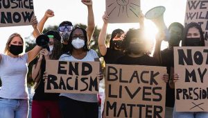 Group of people protesting on topic of Black Lives Matter